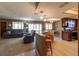 Open concept kitchen and living room with light wood floors at 512 Bahia Cir # 512B, Ocala, FL 34472