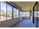 Bright sunroom with ample windows and view of nature at 512 Bahia Cir # 512B, Ocala, FL 34472
