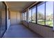 Sunroom boasting large windows and access to outdoor space at 512 Bahia Cir # 512B, Ocala, FL 34472