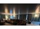 Relaxing living room with sectional sofa and floor lamp at 6701 Se 122Nd Ln, Belleview, FL 34420