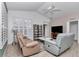 Relaxing living room featuring recessed lighting and a large TV at 6771 Sw 114Th Street Rd, Ocala, FL 34476