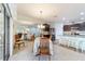 Dining area with table and chairs near kitchen and living room at 6970 Sw 64Th Ter, Ocala, FL 34476