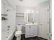 Stylishly updated bathroom featuring modern fixtures, vanity, and shower with elegant tile at 7528 Sw 102Nd Loop, Ocala, FL 34476