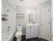 Clean bathroom with marble-tiled shower and vanity at 7528 Sw 102Nd Loop, Ocala, FL 34476