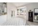 Bright breakfast nook featuring a bay window and a modern pendant light fixture at 7528 Sw 102Nd Loop, Ocala, FL 34476