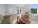 Barn apartment living area with couch and table at 7675 W Highway 326, Ocala, FL 34482
