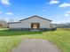 Large metal barn with open center aisle, perfect for horses at 7675 W Highway 326, Ocala, FL 34482