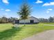 Spacious barn with parking and a picnic table at 7675 W Highway 326, Ocala, FL 34482