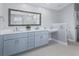 Bathroom with double vanity and built in cabinets at 7675 W Highway 326, Ocala, FL 34482