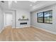 Spacious living area featuring hardwood floors and a view at 7675 W Highway 326, Ocala, FL 34482