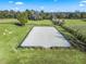 Rectangular riding arena with white sand footing and wooden fencing at 7675 W Highway 326, Ocala, FL 34482
