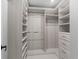 Large walk-in closet with ample shelving and drawers at 7675 W Highway 326, Ocala, FL 34482