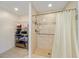 Bathroom with a walk-in shower and ample storage at 8086 Sw 81St Loop, Ocala, FL 34476