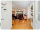 Bright and airy entryway with hardwood floors leading to the living room at 8086 Sw 81St Loop, Ocala, FL 34476