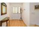 Bright entryway with hardwood floors and decorative accents at 8086 Sw 81St Loop, Ocala, FL 34476