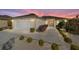 Well-maintained house with a landscaped yard and driveway at 8086 Sw 81St Loop, Ocala, FL 34476