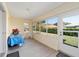 Bright Florida room with plenty of natural light and backyard access at 8086 Sw 81St Loop, Ocala, FL 34476