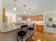 Kitchen boasts an island with seating and ample cabinet space at 8086 Sw 81St Loop, Ocala, FL 34476