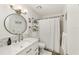 Clean bathroom with white vanity, large mirror, and shower/tub combo at 8580 Sw 97Th Lane Rd # B, Ocala, FL 34481