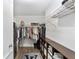 Large walk-in closet with shelving and a gun safe at 8580 Sw 97Th Lane Rd # B, Ocala, FL 34481
