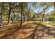 Community park with shaded benches under large trees at 8580 Sw 97Th Lane Rd # B, Ocala, FL 34481