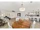 Bright dining area with kitchen views, adjacent to living room at 8580 Sw 97Th Lane Rd # B, Ocala, FL 34481