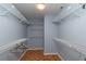 Large walk-in closet with wire shelving for convenient storage at 8653 Sw 96Th St # A, Ocala, FL 34481