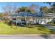 Single-story home with a carport and well-maintained lawn at 8653 Sw 96Th St # A, Ocala, FL 34481