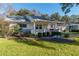 Single-story house with a porch and lush landscaping at 8653 Sw 96Th St # A, Ocala, FL 34481