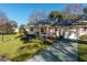 Single-story house with a driveway and landscaping at 8653 Sw 96Th St # A, Ocala, FL 34481