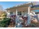 Front porch with white columns and planters at 8653 Sw 96Th St # A, Ocala, FL 34481