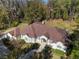 One-story home with a large front yard and driveway at 995 Sw 37Th Place Rd, Ocala, FL 34471