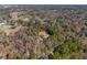 Home surrounded by trees and other houses at 995 Sw 37Th Place Rd, Ocala, FL 34471