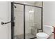 Clean bathroom with walk-in shower and tiled floors at 995 Sw 37Th Place Rd, Ocala, FL 34471