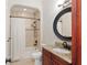 Bathroom features granite vanity, updated fixtures, and shower/tub at 995 Sw 37Th Place Rd, Ocala, FL 34471