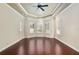 Large bedroom with hardwood floors, neutral walls, and plenty of natural light at 995 Sw 37Th Place Rd, Ocala, FL 34471