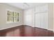 Spacious bedroom with hardwood floors and ample closet space at 995 Sw 37Th Place Rd, Ocala, FL 34471