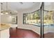 Breakfast nook with view of pool and wooded area at 995 Sw 37Th Place Rd, Ocala, FL 34471