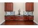 A cozy nook in a hallway features ample storage cabinets and custom cushions at 995 Sw 37Th Place Rd, Ocala, FL 34471