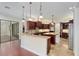 Gourmet kitchen with island and stainless steel appliances at 995 Sw 37Th Place Rd, Ocala, FL 34471