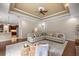 Open-concept living room with wood floors, neutral décor and ample seating at 995 Sw 37Th Place Rd, Ocala, FL 34471