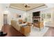 Living room with fireplace and stylish furniture at 995 Sw 37Th Place Rd, Ocala, FL 34471