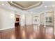 Elegant living room with hardwood floors, high ceilings, and a view of the backyard at 995 Sw 37Th Place Rd, Ocala, FL 34471