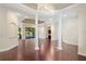 Open living room with hardwood floors and high ceilings at 995 Sw 37Th Place Rd, Ocala, FL 34471