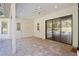 Covered patio with access to pool and interior at 995 Sw 37Th Place Rd, Ocala, FL 34471