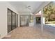 Covered patio with access to pool and interior at 995 Sw 37Th Place Rd, Ocala, FL 34471