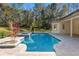 Beautiful pool and spa with a large patio, creating an outdoor oasis at 995 Sw 37Th Place Rd, Ocala, FL 34471