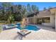 Relaxing pool and spa with patio, overlooking a tranquil backyard at 995 Sw 37Th Place Rd, Ocala, FL 34471