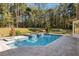Resort-style pool with spa and spacious patio, ideal for entertaining at 995 Sw 37Th Place Rd, Ocala, FL 34471