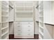 Large walk-in closet with ample shelving and hanging space at 995 Sw 37Th Place Rd, Ocala, FL 34471